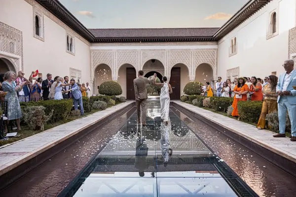 Wedding ceremony in riad courtyard with water feature - photography in marrakech