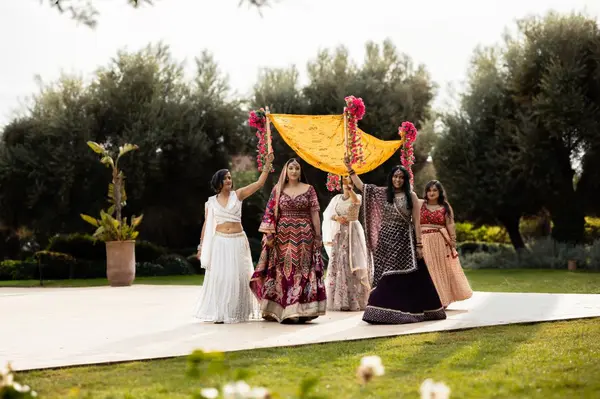 Indian destination wedding bridal procession garden - destination wedding photographer